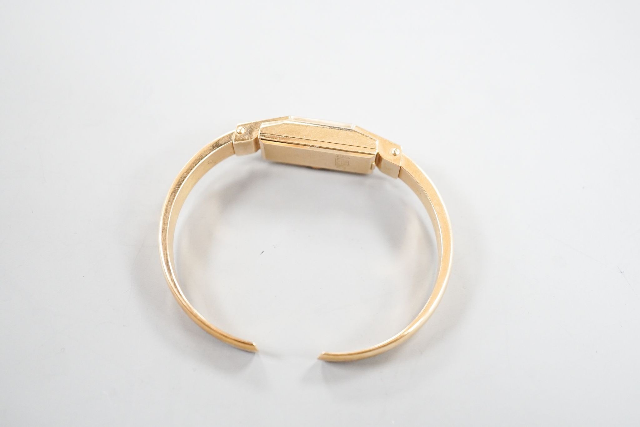 A lady's 18k Verbena open hinged bangle manual wind wrist watch